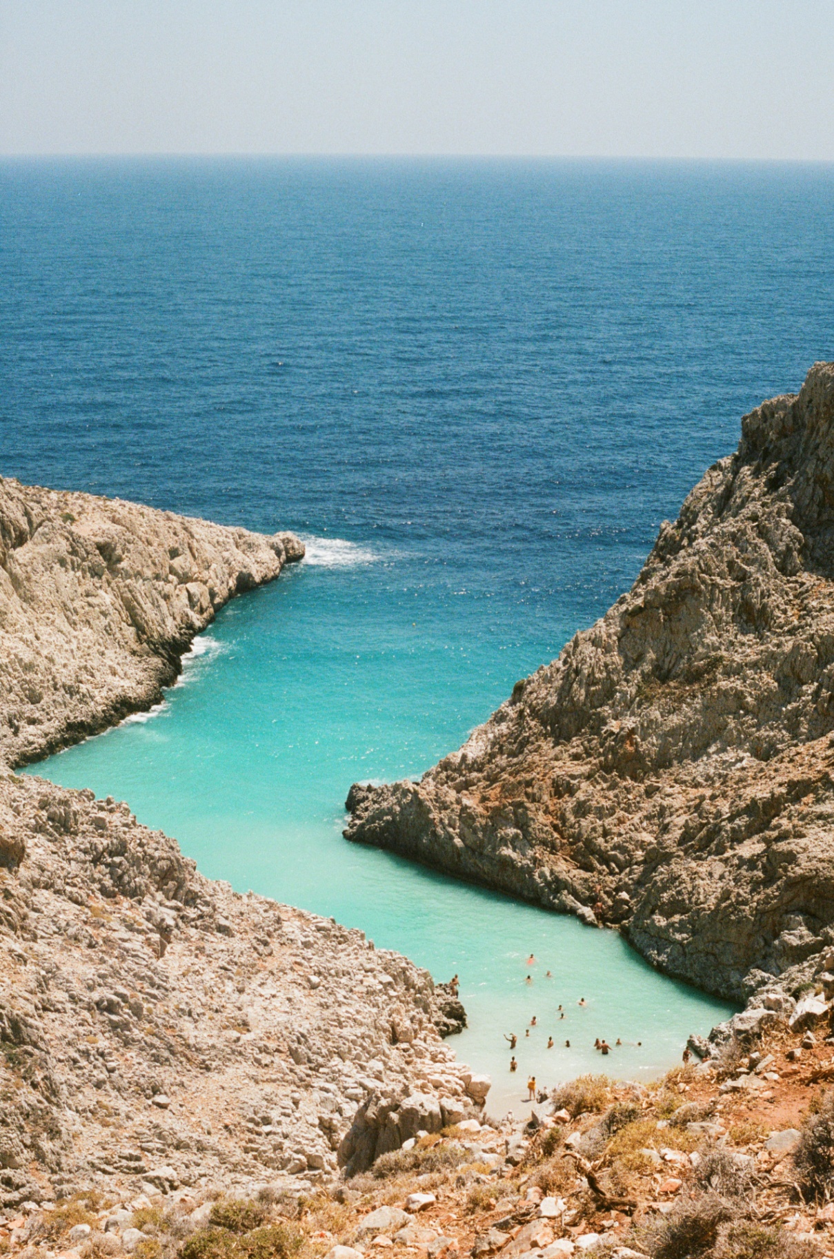 A Mediterranean rocky cove with turquoise water